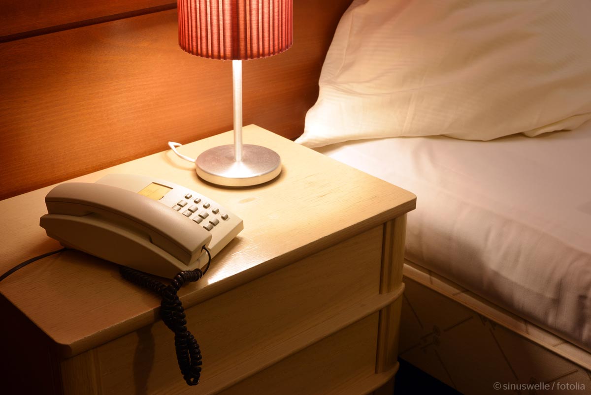 Telephone by bed